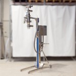 Mobile lifting column for vacuum conveyor