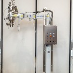 Fixed Column with Orbital Arm for Vacuum Transfer System
