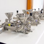 Aspiration hopper for conveyor