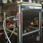 Pneumatic Vibrator with Rectangular Suction Cup mounted on Pharma Bin (IBC container)