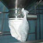 Linear Pneumatic Piston Vibrator installed on Bin (IBC) using Tri-Clamp connection