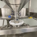 Tight soft gasket for dust-free powder discharge