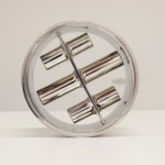 Close-Up Side View of a Small Stainless Steel Magnetic Separator with Cylindrical Bars