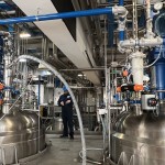 Two Vacuum Conveyors Used for Reactor Loading from Drums