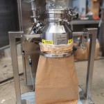 Tightly Clamped Bag for Dust-Free Powder Dosing