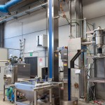 Integrated System for Lifting, Milling, and Discharging Bins