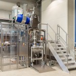 Drum Discharge System for Cenobamate Powder Dosing into IBC/Bins via Split Valve (with Drum connected to Glove Box)