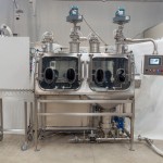 Dual Chamber Glove Box for Emptying Bags with Powders