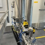 Aspiration Hopper with Purge and Drainage Phases