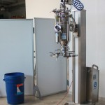Mobile lifting column for vacuum conveyor