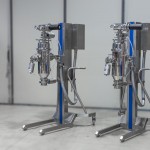 Mobile lifting column for vacuum conveyor